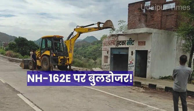 Bulldozer action on NH 162 E