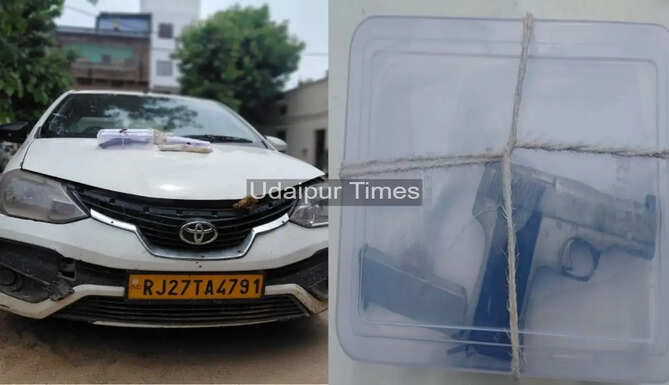 Badisadri Police displaying a seized country-made pistol, live cartridges, knife and Toyota Etios car after foiling an alleged dacoity plan in Chittorgarh, Rajasthan.