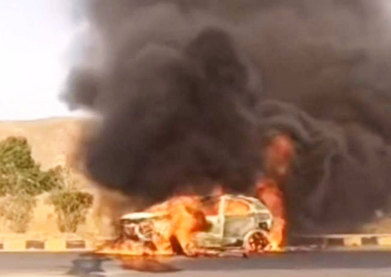 Car catches fire after hitting divider youth escapes unhurt